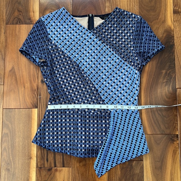 BCBGMaxAzria peplum short sleeve top. Size small - Picture 10 of 11